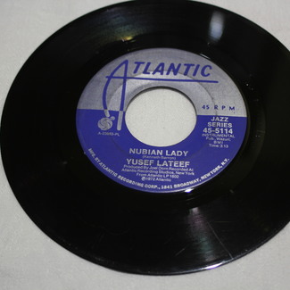 BELOW YELLOW BELL / NUBIAN LADY