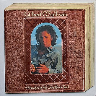 A Stranger In My Own Back Yard by Gilbert O'Sullivan