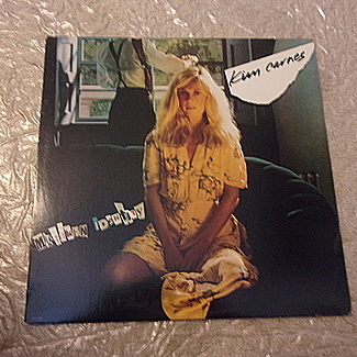 Mistaken Identity by Kim Carnes
