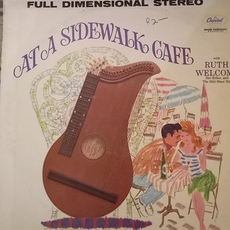 At A Sidewalk Cafe by Ruth Welcome