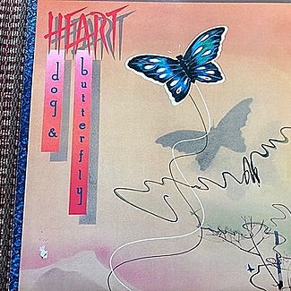 Dog And Butterfly by Heart