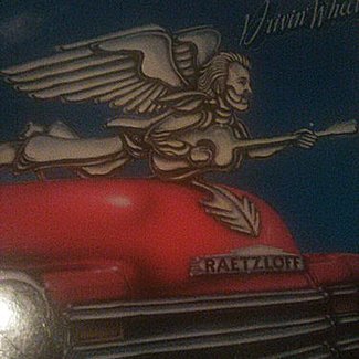 Drivin wheels by Ed Raetzloff