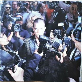 Life Thru A Lens by Robbie Williams