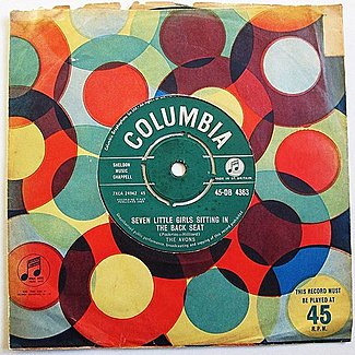 Seven Little Girls Sitting In The Back Seat by The Avons